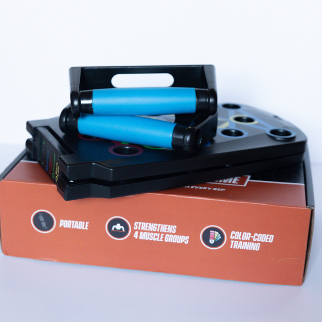 Clingman PressFrame push-up board folded on its box